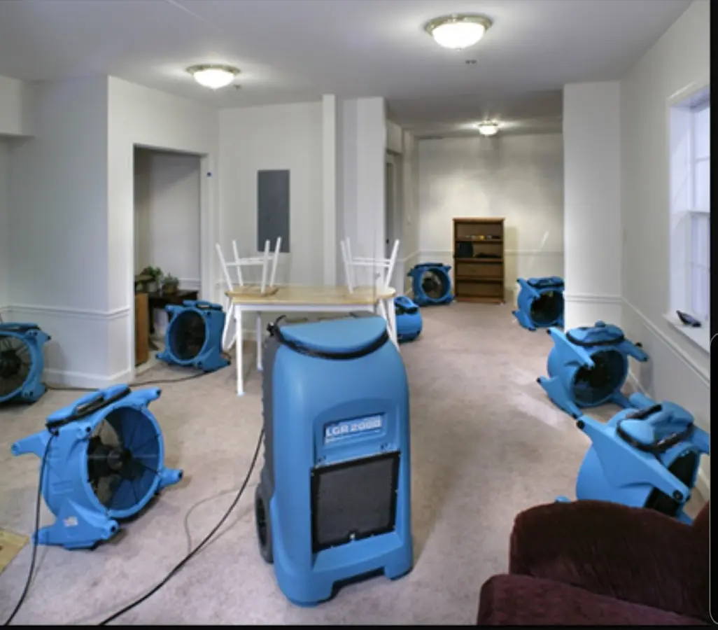 Air movers and dehumidifier setup for Water Damage Restoration in Northfield